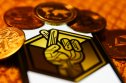 Who owns the most lucky block Lucky Block logo displayed on a phone screen and representation of cryptocurrencies are seen in this illustration
