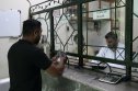 Pakistan recession A man exchanges money at exchange office