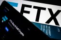 FTX A series of smartphones display the FTX logo and mobile app adverts