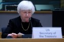 Janet Yellen Janet Yellen, US Treasury Secretary, looks at her notes in front of a microphone