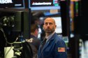 Investors fret over the impact on the global economy of aggressive rate rises Trader on the floor at the closing bell