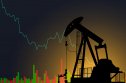 Oil prices illustration Oil pump on the background of stock charts