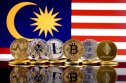 Cryptocurrency fisik dengan bendera Malaysia 