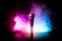 singing machine company short squeeze Microphone on a colored background