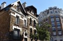 France house price crash Beautiful building facade in Paris, France.