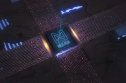 NEAR coin prediction NEAR coin logo beamed onto a futuristic screen in blue light, superimposed onto a circuit board design