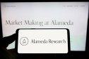 Alameda Research Alameda Research logo on smartphone and computer screen