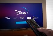 Disney+ is the company's streaming TV and film service A viewer turns on a TV to watch Disney+