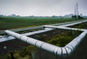Pipeline through farm land in Norway Stock photo of a natural gas pipeline running through farm land in Norway