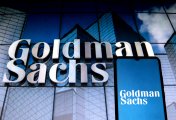 Goldman Sachs In this photo illustration a Goldman Sachs Group logo seen displayed on a smartphone with a Goldman Sachs Group logo in the background