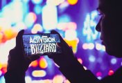 Activision Blizzard A image of Activision Blizzard logo is displayed on a smartphone