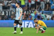 Lionel Messi Lionel Messi (10) of Argentina celebrates their victory and a player of Australia gets upset after the FIFA World Cup Qatar 2022 Round of 16 match between Argentina and Australia at Ahmad Bin Ali Stadium in Al Rayyan, Qatar on 3 December, 2022