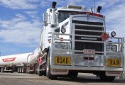 More inflation means higher interest rates and lower output and fewer jobs. How will the RBA manage the tensions? Large truck, central Australia Outback