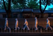 While signs are emerging that lockdowns maybe eased in Shanghai, new infections in Beijing could see tighter restrictions in the capital Health workers outside a community in Beijing that is locked down