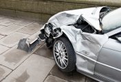 Admiral shares under pressure as drivers change down on costs Silver car crash side view