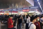 Gold People queing to buy gold in Laos as the local currency collapses