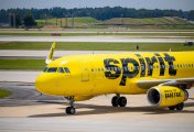 Bidding for Spirit Airlines heats up between Frontier and JetBlue Spirit Airlines airplane on tarmac