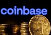 A representation of the cryptocurrency is seen in front of Coinbase logo in this illustration taken, March 4, 2022. A representation of the cryptocurrency is seen in front of Coinbase logo in this illustration taken, March 4, 2022.