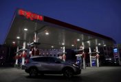 A file photo of cars seen at an Exxon gas station in Brooklyn, New York City, U.S., November 23, 2021. A file photo of cars seen at an Exxon gas station in Brooklyn, New York City, U.S., November 23, 2021.