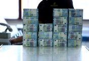 A file photo of packs of 20-euro notes seen at the Bank of Portugal fortified complex in Carregado, Alenquer, Portugal, May 17, 2022. A file photo of packs of 20-euro notes seen at the Bank of Portugal fortified complex in Carregado, Alenquer, Portugal, May 17, 2022.