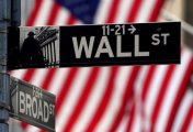 A Wall Street sign is pictured outside the New York Stock Exchange amid the coronavirus disease (COVID-19) pandemic in the Manhattan borough of New York City, New York, U.S., April 16, 2021. A Wall Street sign is pictured outside the New York Stock Exchange amid the coronavirus disease (COVID-19) pandemic in the Manhattan borough of New York City, New York, U.S., April 16, 2021.