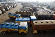 A file photo of oil tankers parked at a yard outside a fuel depot on the outskirts of Kolkata February 3, 2015. A file photo of oil tankers parked at a yard outside a fuel depot on the outskirts of Kolkata February 3, 2015.