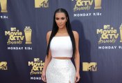 A photo of Kim Kardashian. A photo of Kim Kardashian.