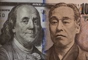 USD/JPY Dollar and Yen banknotes close-up