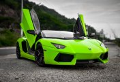 Lamborghini Green Lamborghini Aventador on the sidewalk