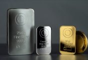 Gold and silver bars A row of gold and silver bars along with a coin