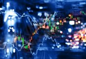 NSE Nifty 50 Stock market tickers seen on reflection on glass
