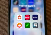 Mind Medicine Inc. A image of meme stock logos on a mobile phone screen