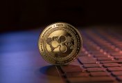 Ripple (XRP) Representation of the ripple cryptocurrency, XRP, on a computer keyboard