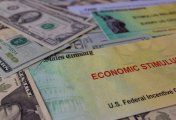 US economic stimulus Stimulus package financial package government for people, US dollar cash banknote on American flag