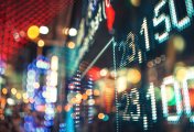 NSE Nifty 50 Stock charts on the backdrop of city lights