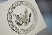 A file photo shows the U.S. Securities and Exchange Commission logo on an office door at the SEC headquarters in Washington, June 24, 2011. A file photo shows the U.S. Securities and Exchange Commission logo on an office door at the SEC headquarters in Washington, June 24, 2011.