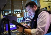 A trader works on the floor of the New York Stock Exchange (NYSE) in New York City, U.S., June 27, 2022. A trader works on the floor of the New York Stock Exchange (NYSE) in New York City, U.S., June 27, 2022.