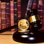 The XRP coin on a gavel