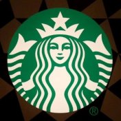 A file photo of a Starbucks logo pictured on the door of the Green Apron Delivery Service at the Empire State Building in the Manhattan borough of New York, U.S. June 1, 2016. 