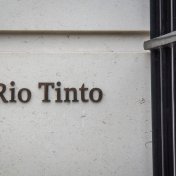 Rio Tinto stock forecast Signage logo at the entrance of the Rio Tinto head office on St James's Square- a leading British global mining group