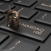 NASDAQ 100 forecast 2022 A key on a computer keyboard adapted to say NASDAQ 100, with a small gold bull charm sitting on it