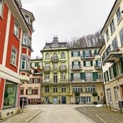 Switzerland house price crash Traditional Swiss houses and old residential architecture in Weesen settlement on the shores of Lake Walen or Lake Walenstadt (Walensee)