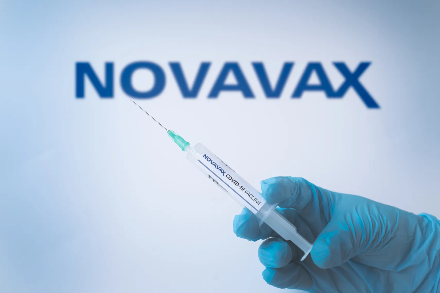 Novavax (NVAX) stock forecast Istanbul, TR - January 29 2021: Novavax vaccine. syringe close up. covid-19 vaccination. medicine, healthcare and pandemic concept disease, medical gloves injection inject. protection.