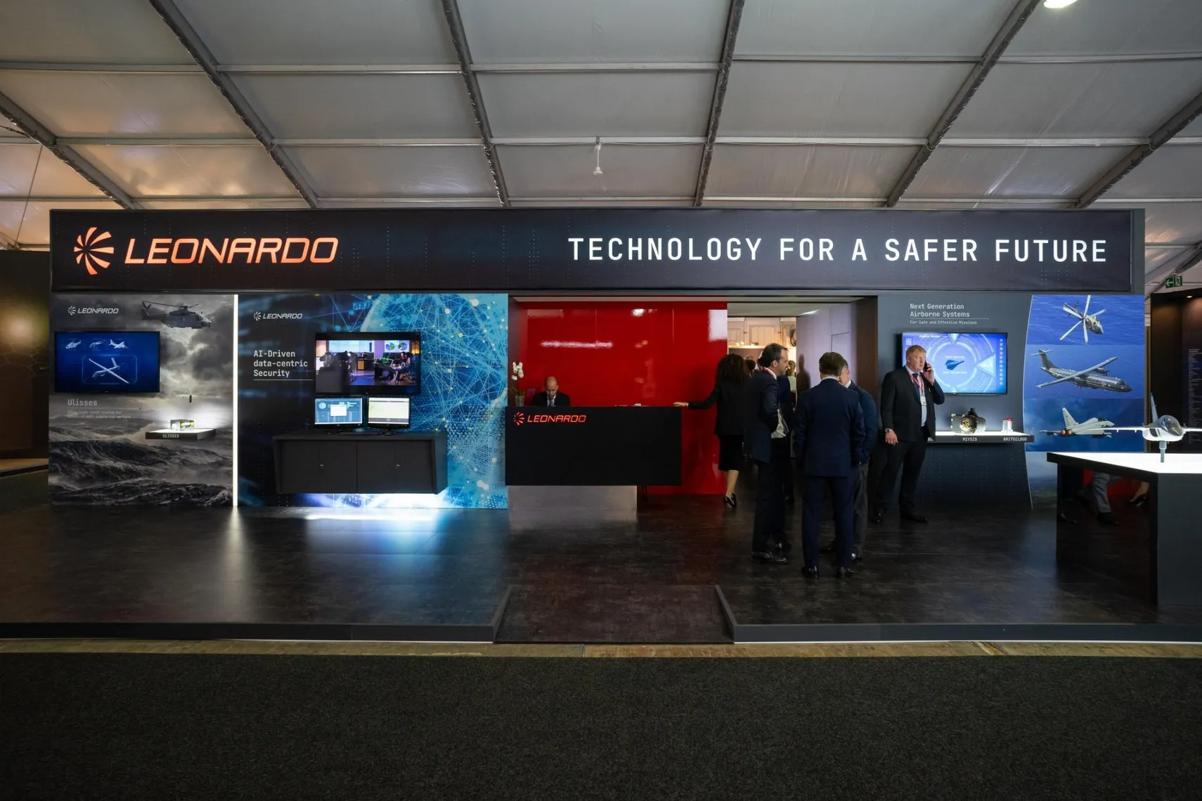 eonardo corporate booth presenting aerospace and defense systems at an industry exhibition. eonardo corporate booth presenting aerospace and defense systems at an industry exhibition.