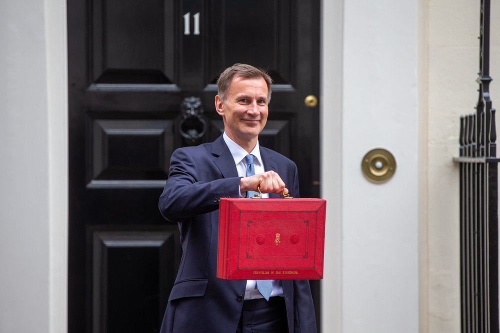 Chancellor of the Exchequer Jeremy Hunt hold ministerial box outside 11 Downing Street ahead of budget statement.