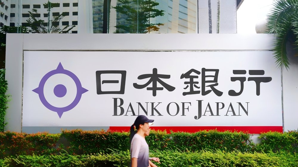 A woman passing through in front of The Bank of Japan, Nippon Ginkō