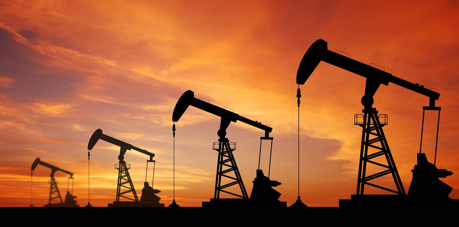 Oil pump oil rig energy industrial machine for petroleum in the sunset background Oil pump oil rig energy industrial machine for petroleum in the sunset background