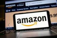 photo illustration an Amazon logo seen displayed on a smartphone. photo illustration an Amazon logo seen displayed on a smartphone.