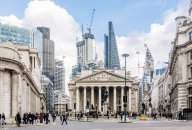 UK projected interest rates in 5 years Street in City of London with Royal Exchange, Bank of England and new modern skyscrapers