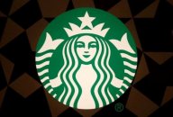A file photo of a Starbucks logo pictured on the door of the Green Apron Delivery Service at the Empire State Building in the Manhattan borough of New York, U.S. June 1, 2016. A file photo of a Starbucks logo pictured on the door of the Green Apron Delivery Service at the Empire State Building in the Manhattan borough of New York, U.S. June 1, 2016.